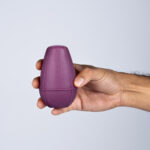 Juguete Conic Lila en la mano (tamaño mediano)